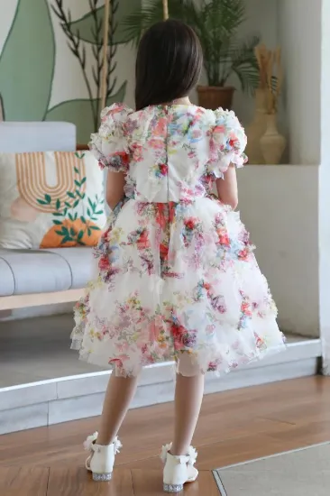 صورة فستان مورد كرنشة من االاسفل