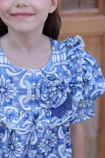 صورة فستان بناتي أزرق مشجر